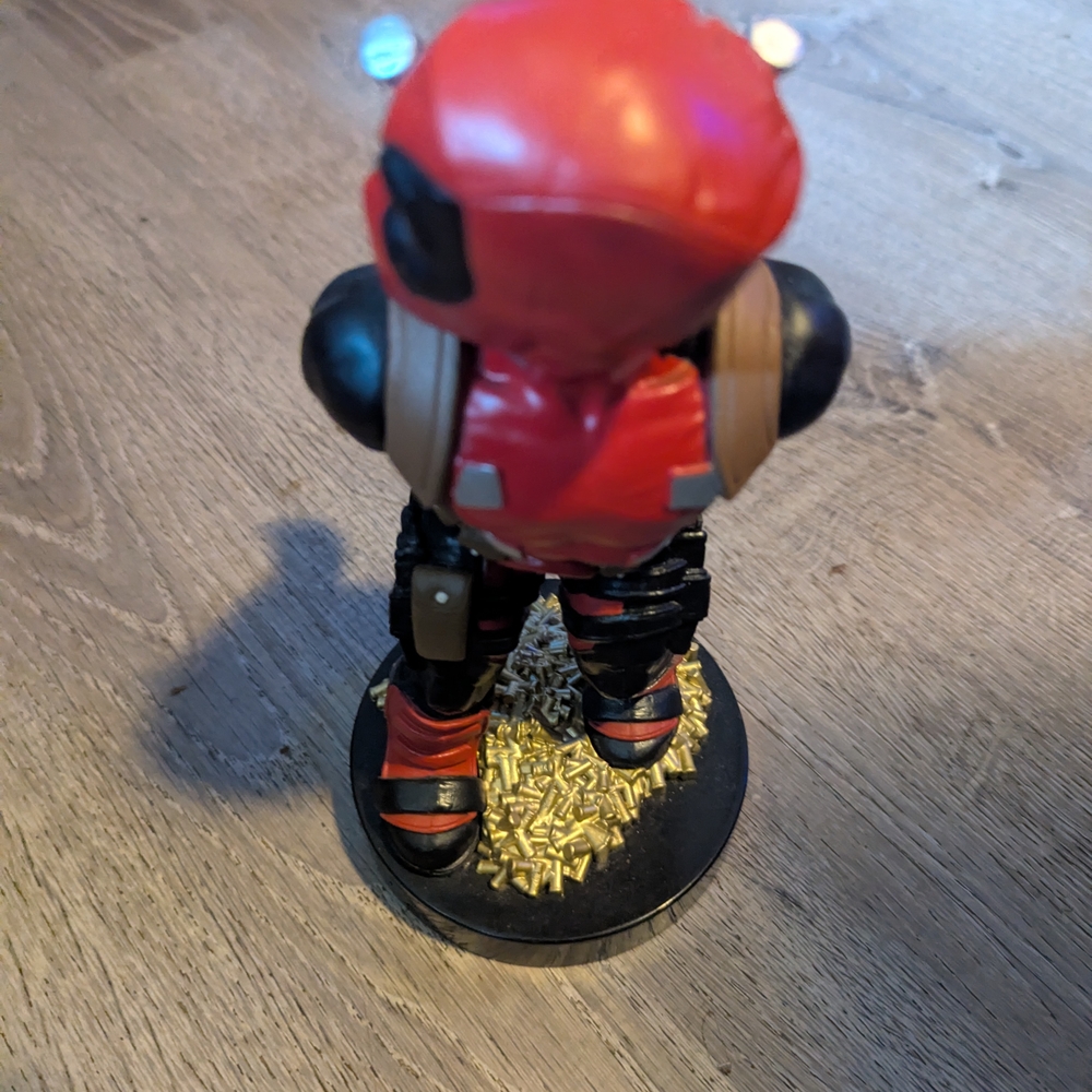 Red and Black Action Figure